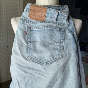 distressed light wash levi’s red tag